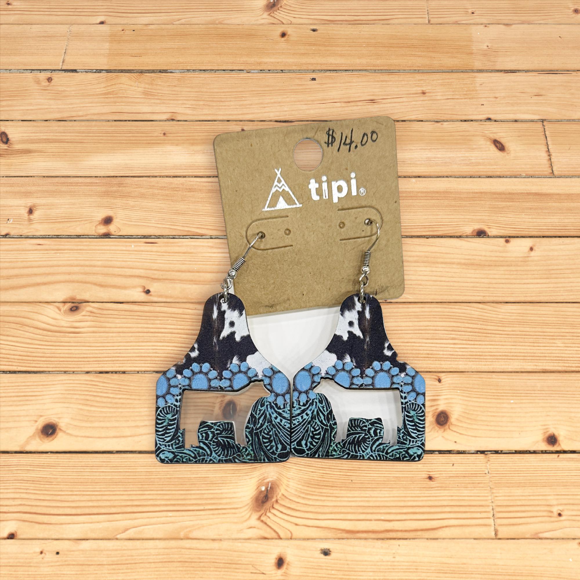 Cow print and teal earrings