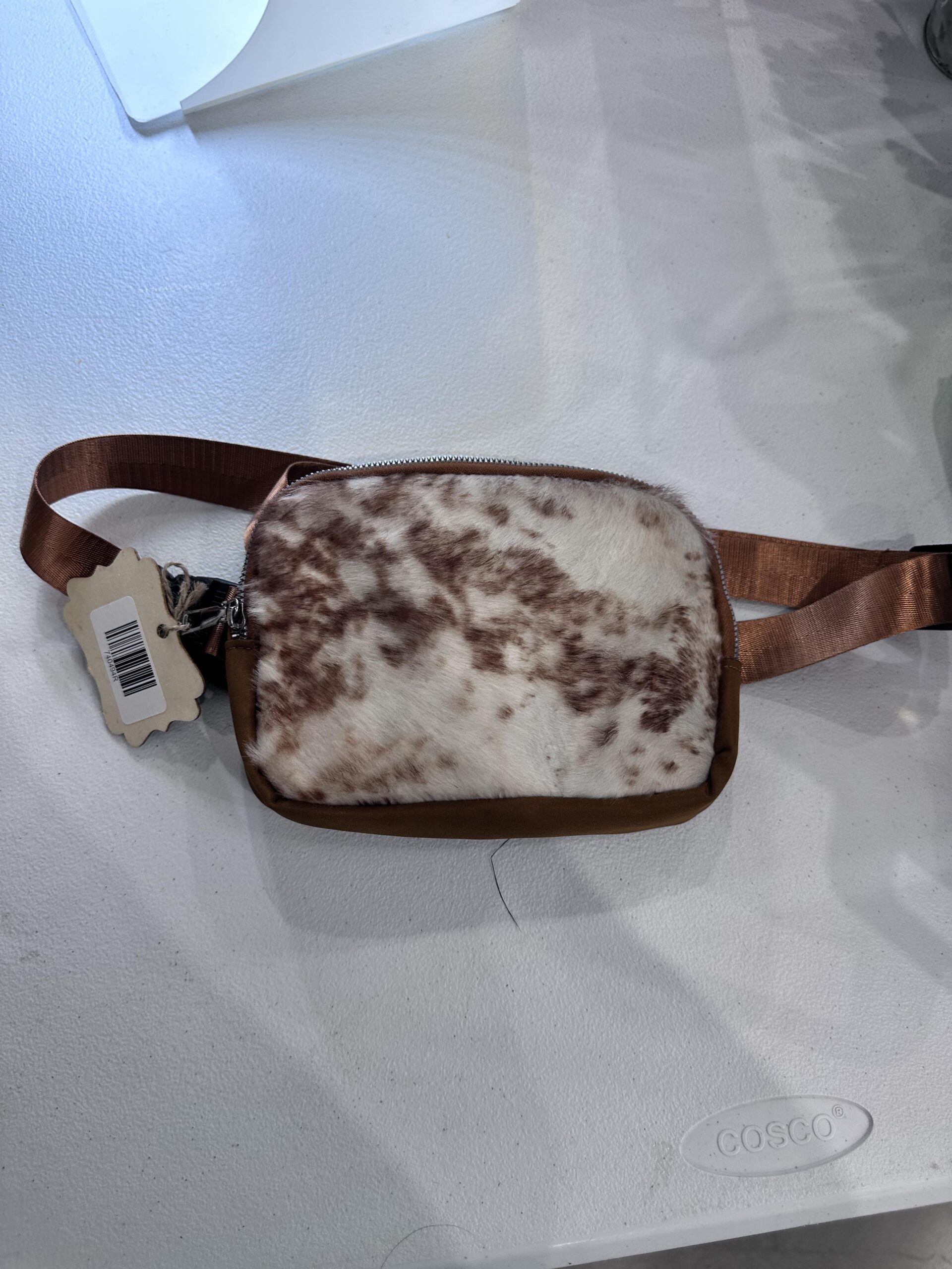 handmade brown leather crossbody with cowhide