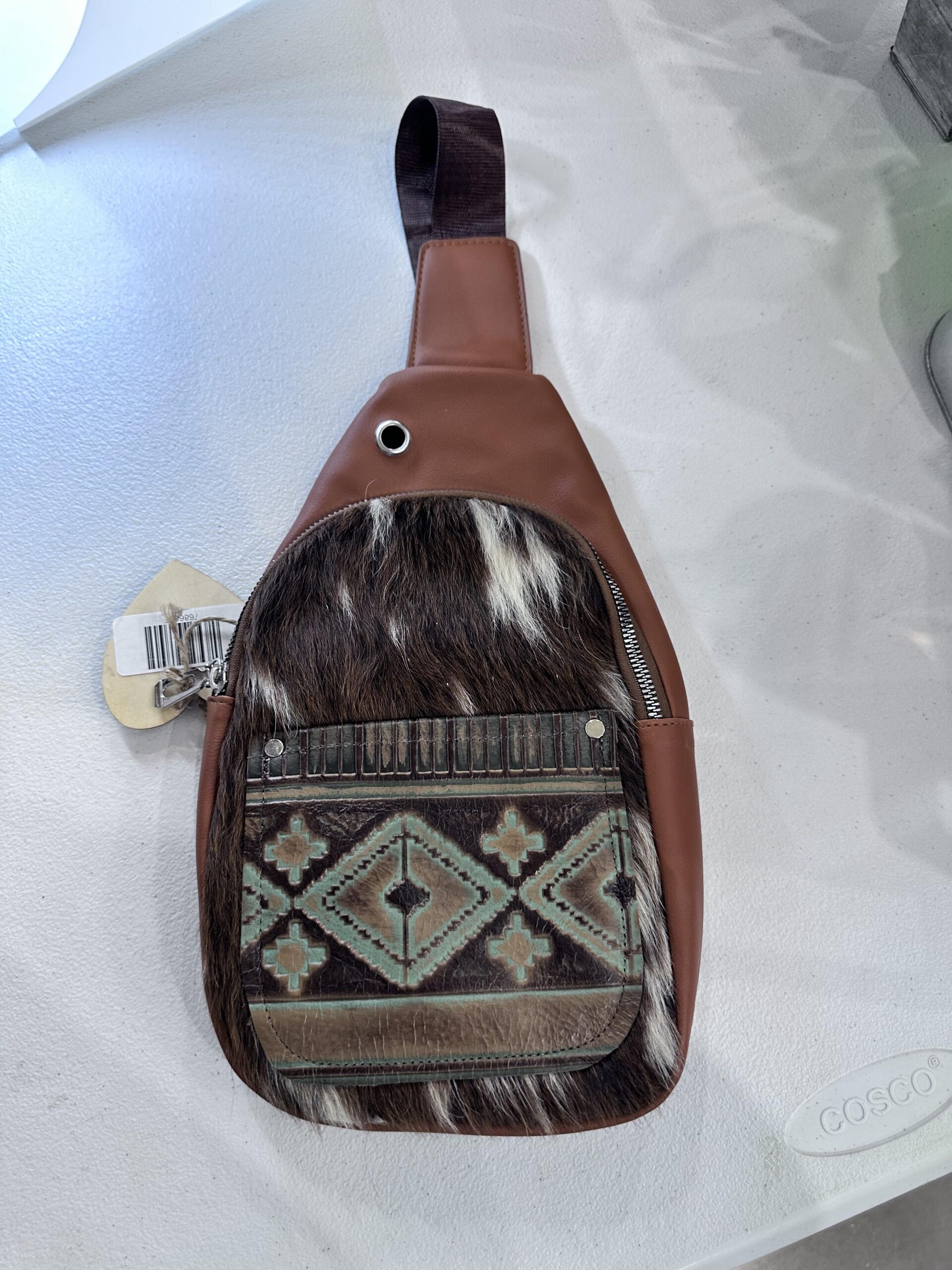 cowhide and brown leather crossbody purse