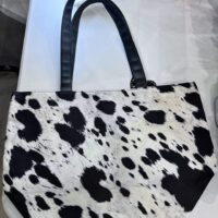 black and white cowhide print purse