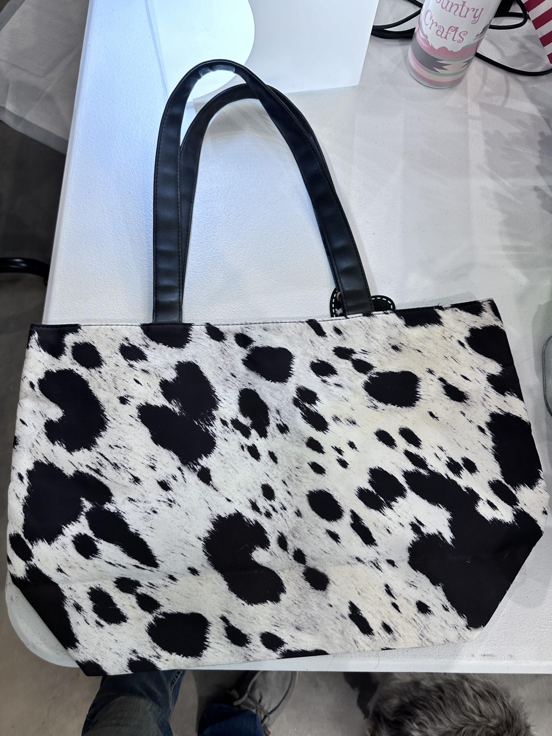 black and white cowhide print purse