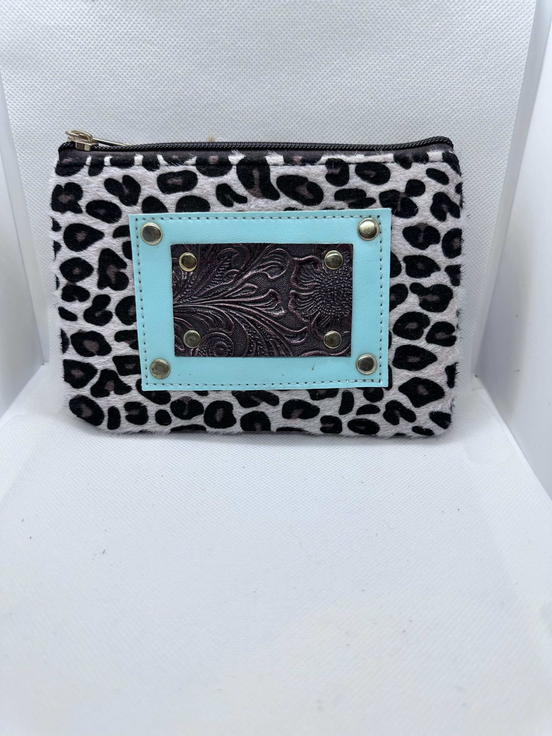 cheetah print wallet with turquoise accent