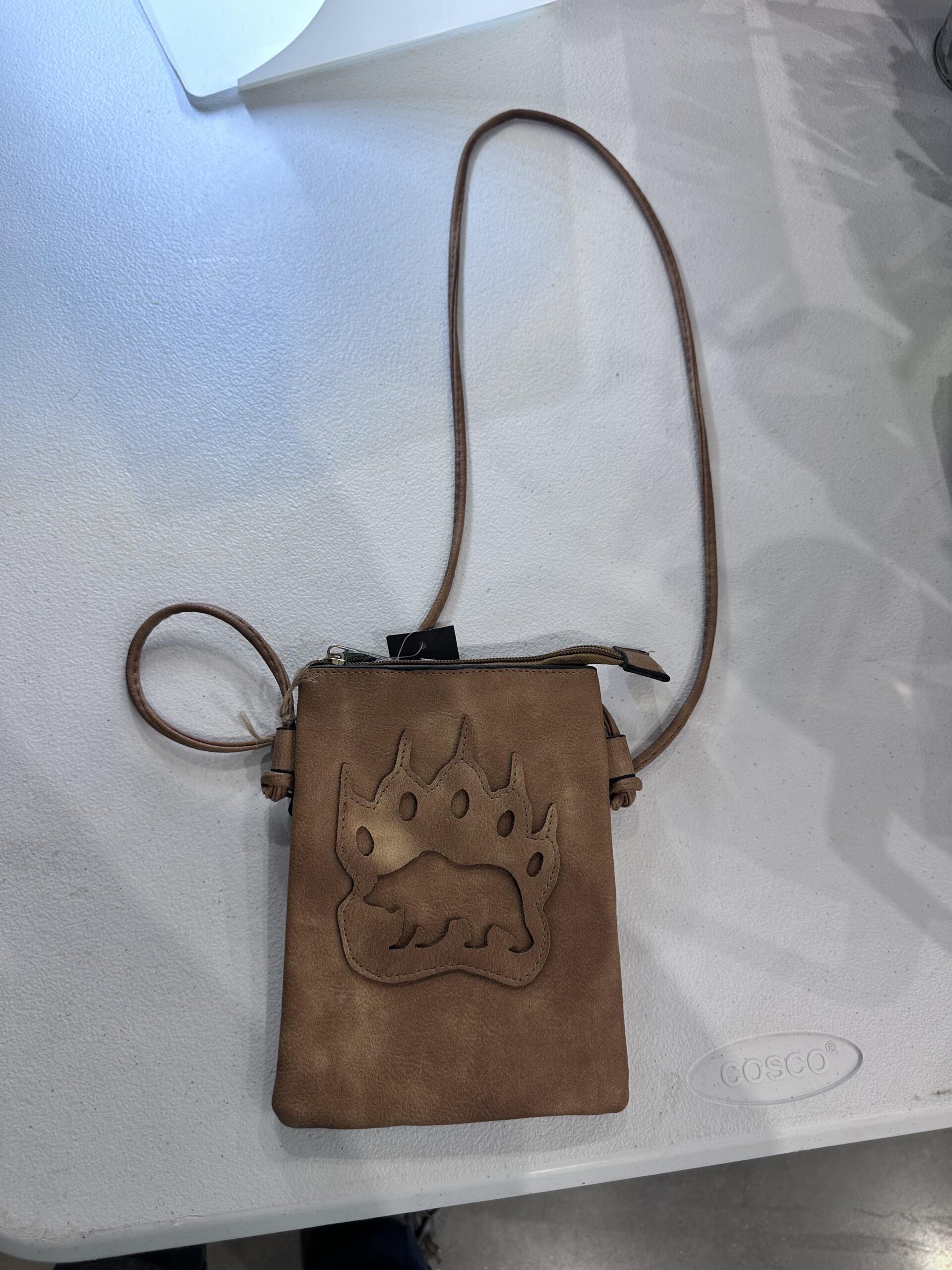 leather crossbody purse with bear paw design