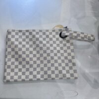 white and grey checkered wristlet