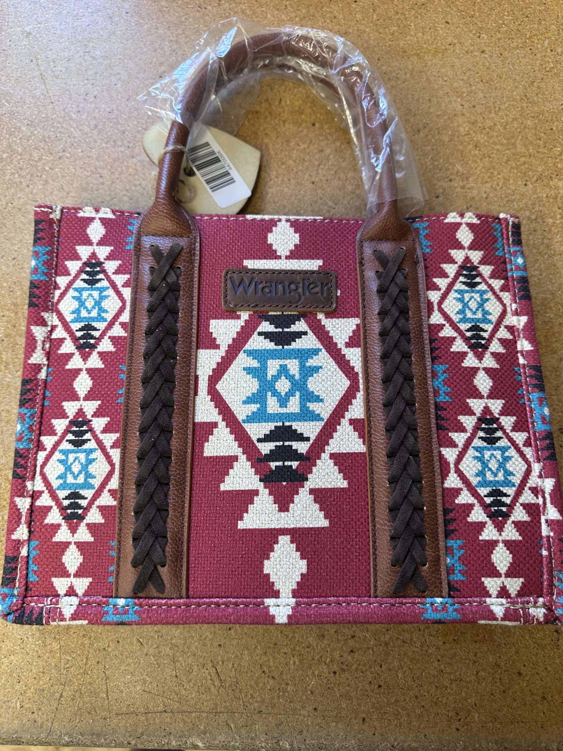 Small sized maroon and turquoise Wrangler purse