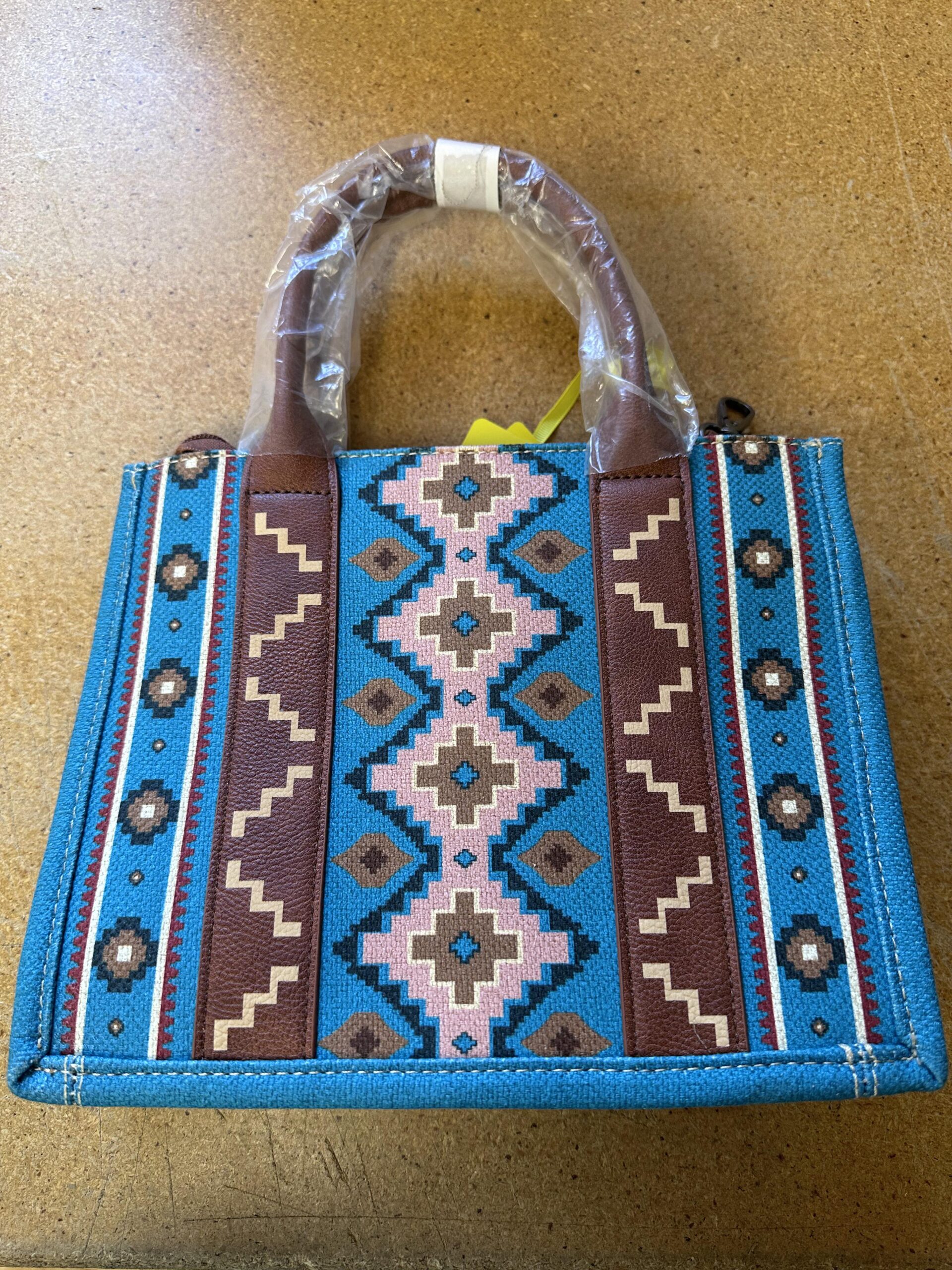 Small sized Wrangler turquoise leather purse