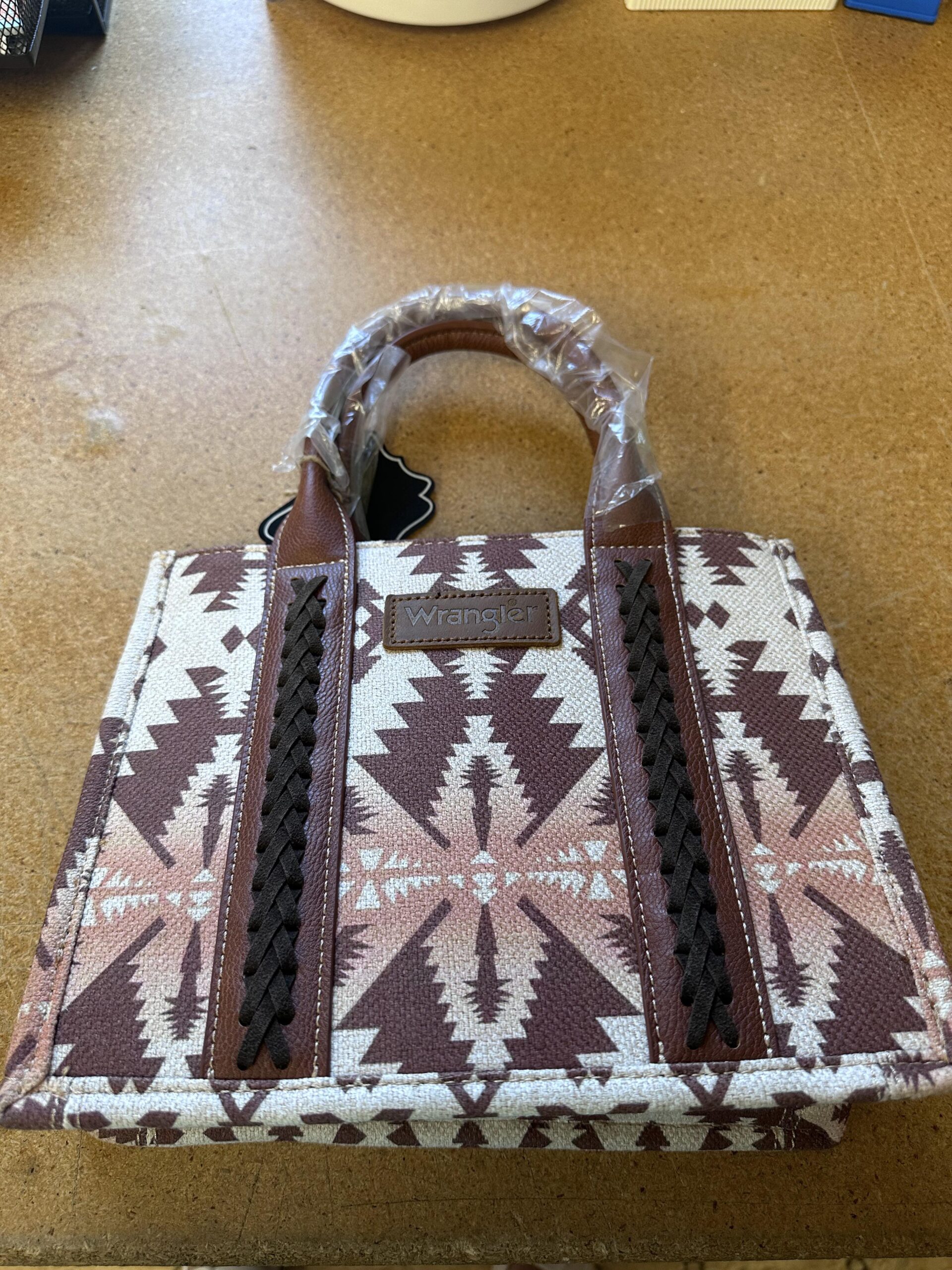 Small sized white and brown leather Wrangler purse